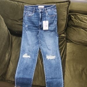 Distressed Blue Jeans